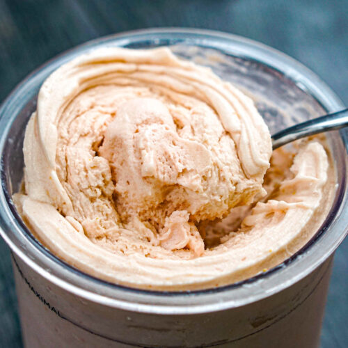 Closeup of a container of Ninja Creami strawberry cheesecake ice cream that's low carb and sugar free.