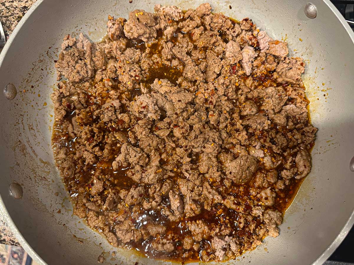 The finished Asian flavored ground turkey meat.