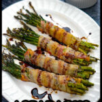 A white platter with a 4 bacon wrapped asparagus bundles with balsamic glaze and text overlay.