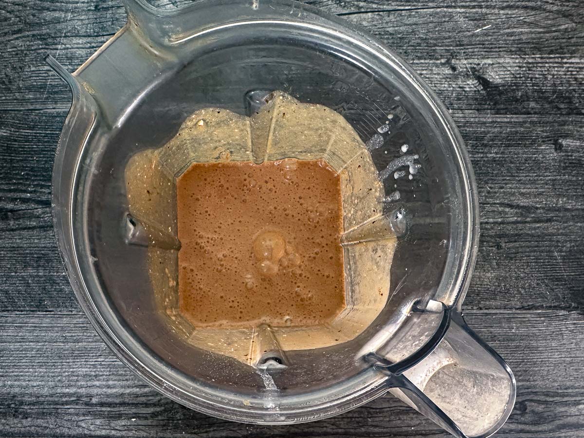 Blender pitcher with ice cream base.