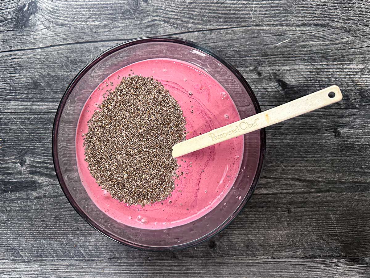 Big bowl with the yogurt mixture and the seeds on top.