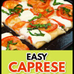 Baking sheet with caprese flatbread with a a sprig of basil in the background and text.