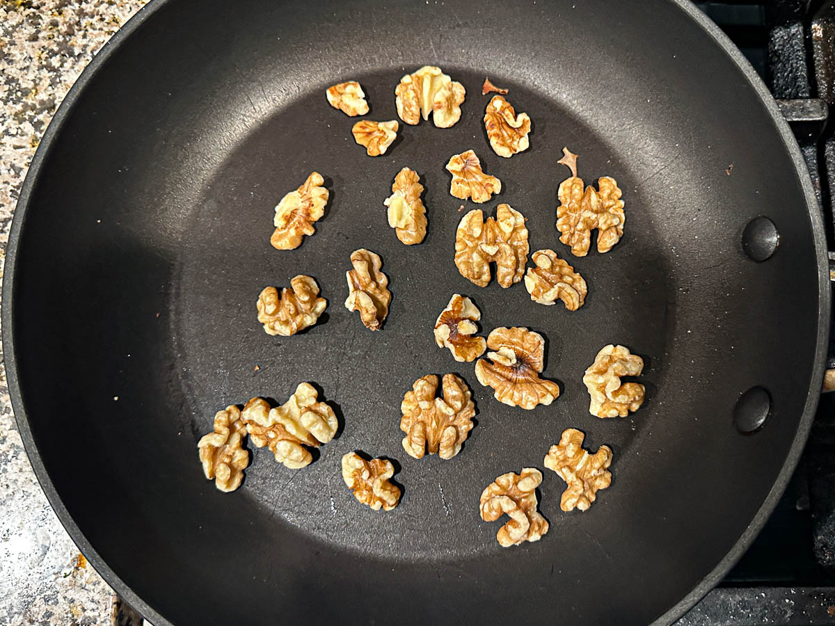 Pan with toasted walnuts.