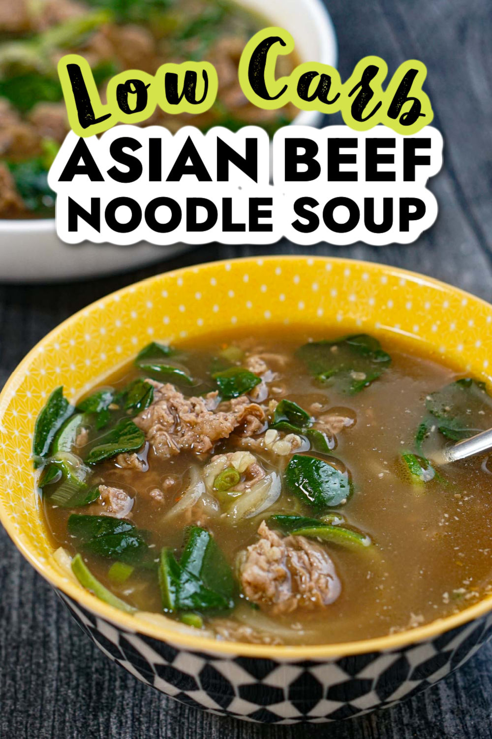 Close up of a yellow bowl of the low carb Asian beef soup and text.